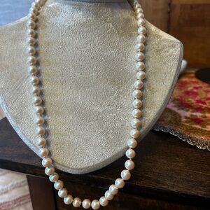Elegant Cream Pearl Strand Necklace
Clasp marked silver